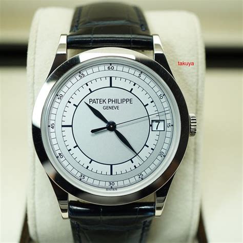 patek philippe 5296g 18k white gold calatrava silver sector dial